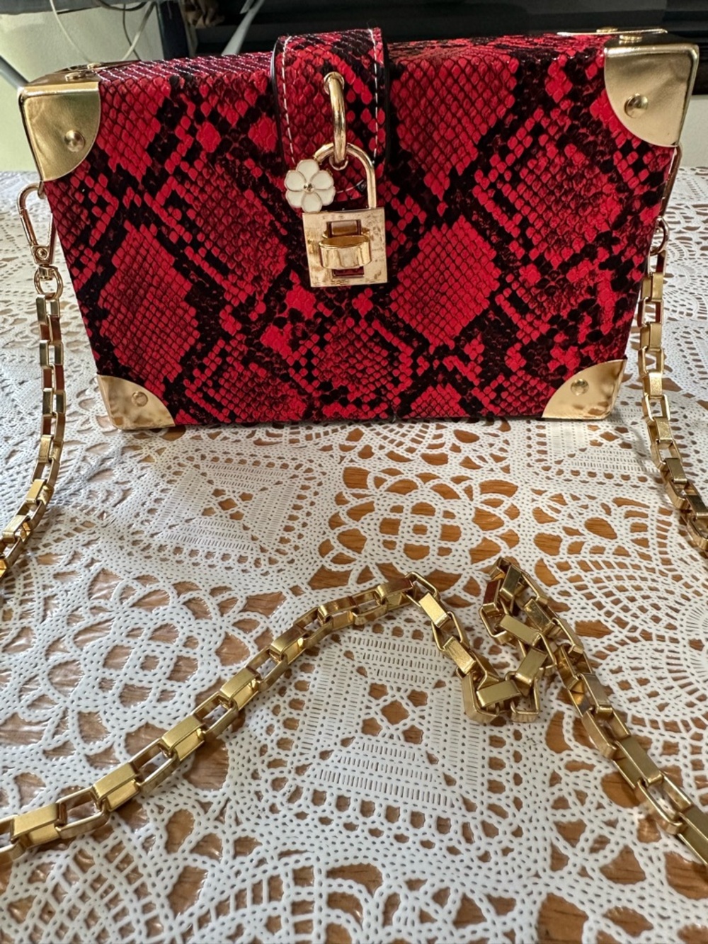 Gold-Accented Red Snake-Print Crossbody Bag